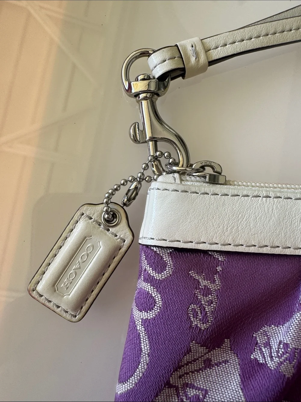 Coach Purple Wristlet with White Trim and Carriage Motif